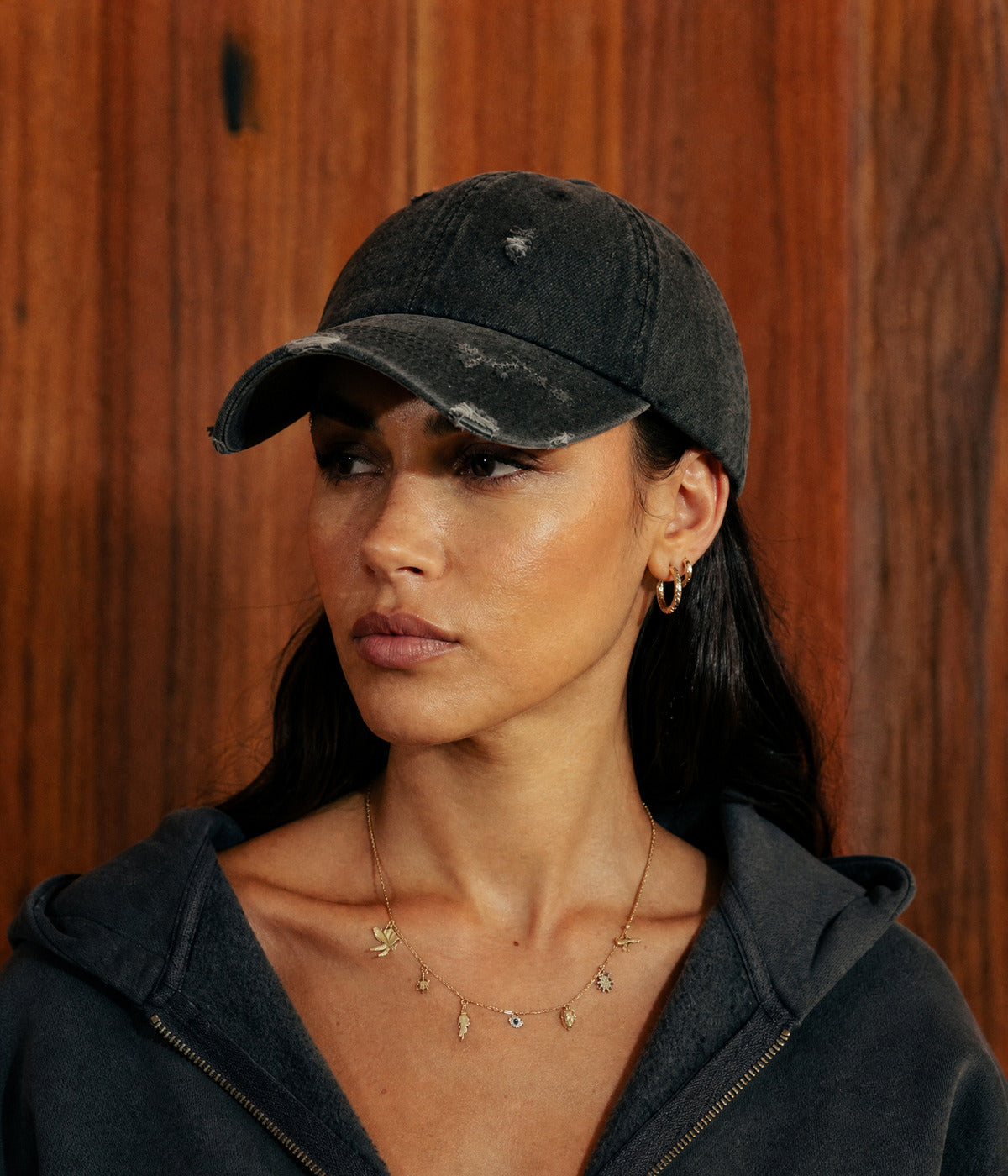 DENIM. BLACK worn by a woman