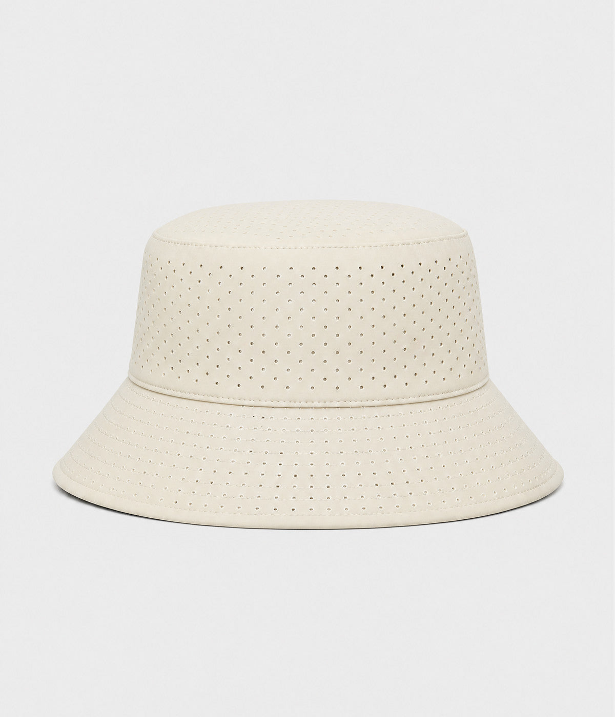 PERFORATED BUCKET. perforated bucket hat in beige, front view