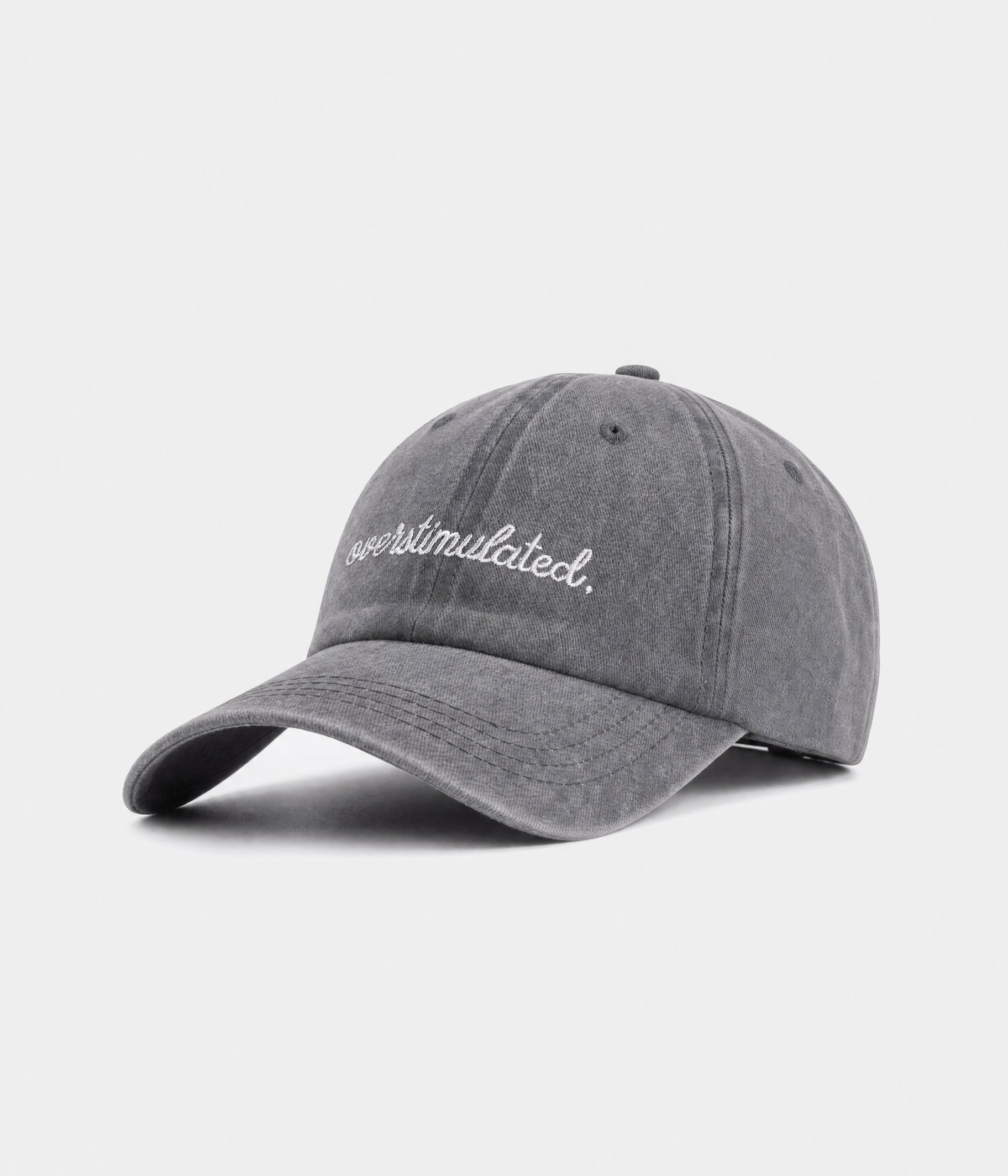 OVERSTIMULATED. washed cotton dad cap in gray, side view