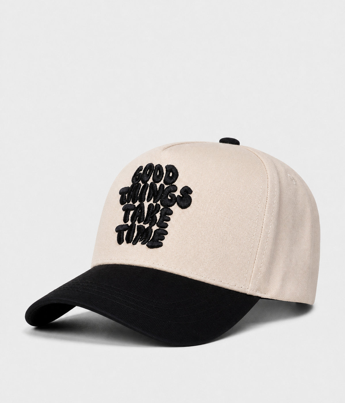 GOOD THINGS TAKE TIME SNAPBACK. cream cotton snapback with BLACK visor, side view