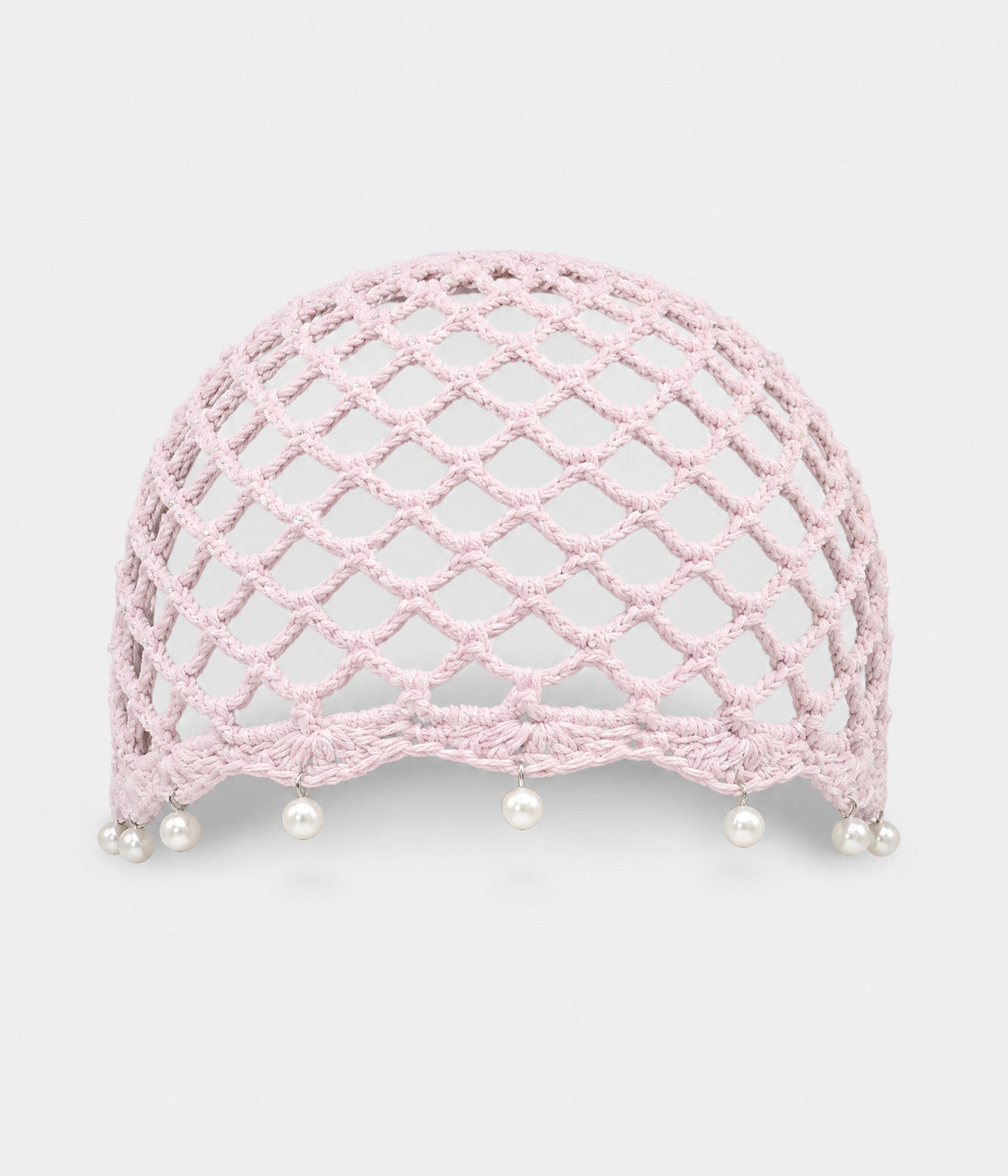 PEARL CROCHET CAP. open-mesh crochet cloche with pearl trim in light pink, front view