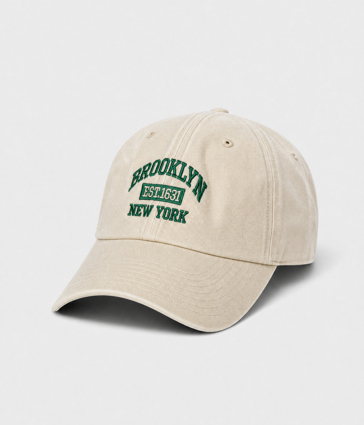 BROOKLYN NY. washed cotton dad cap in cream, side view