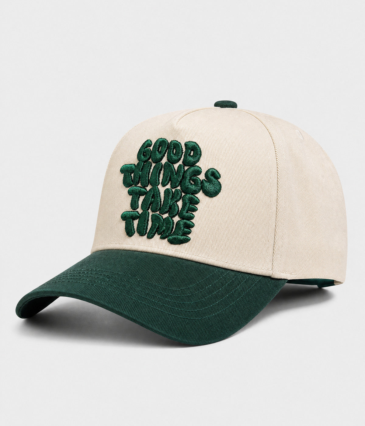 GOOD THINGS TAKE TIME SNAPBACK. cream cotton snapback with GREEN visor, side view
