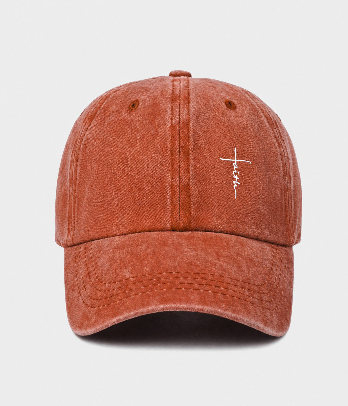 FAITH CROSS. washed cotton cap in RUST, front view