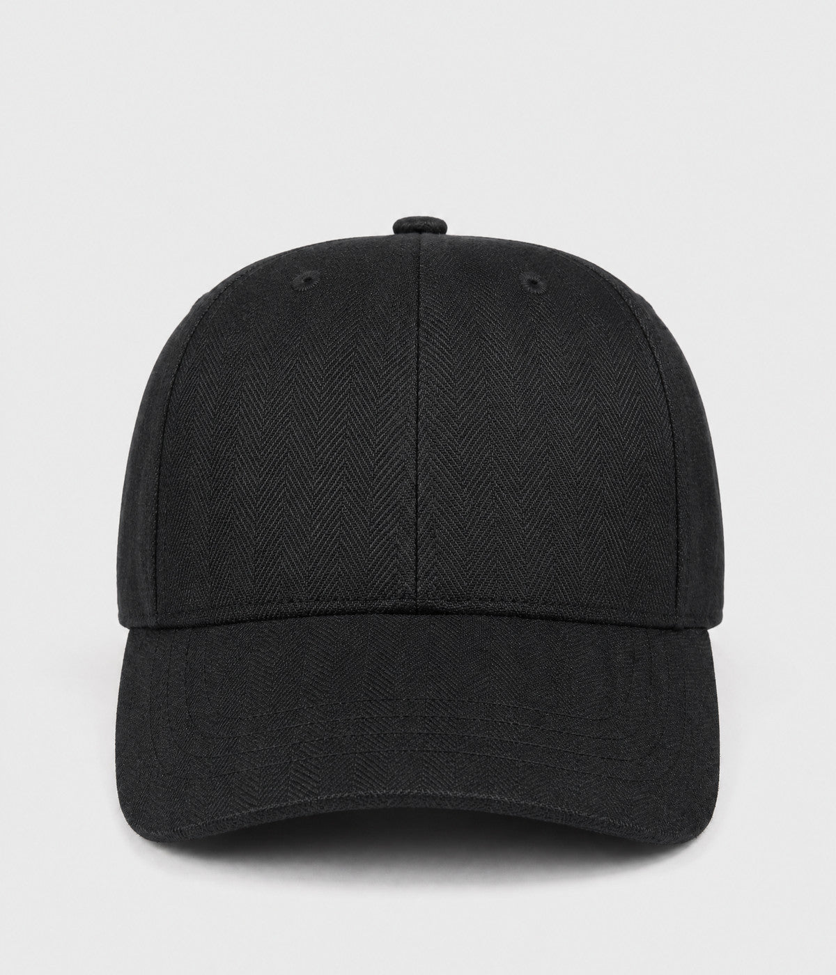 HERRINGBONE LINEN CAP. herringbone linen cap in black, front view