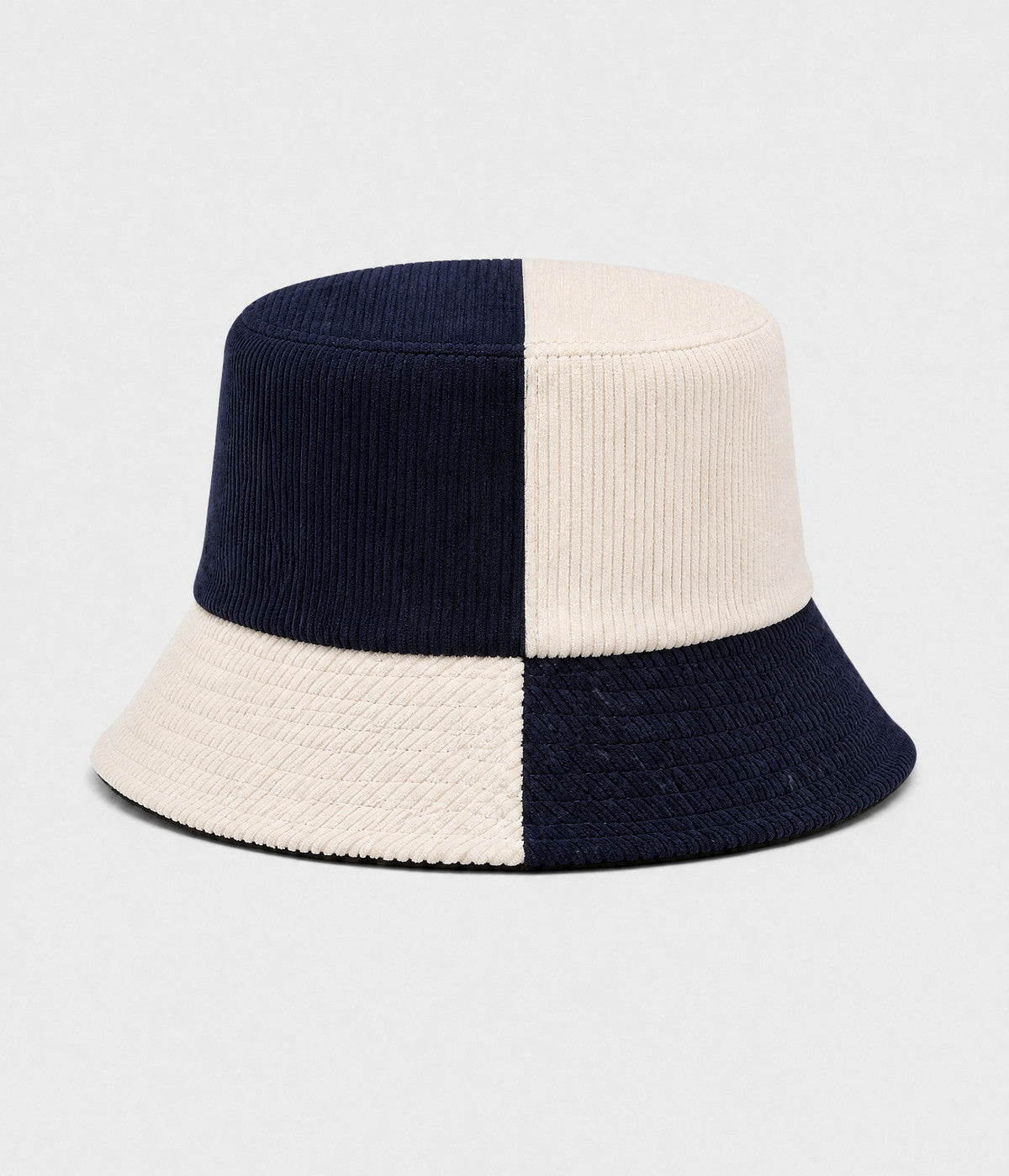 PATCHWORK BUCKET. corduroy bucket hat in NAVY BEIGE, front view