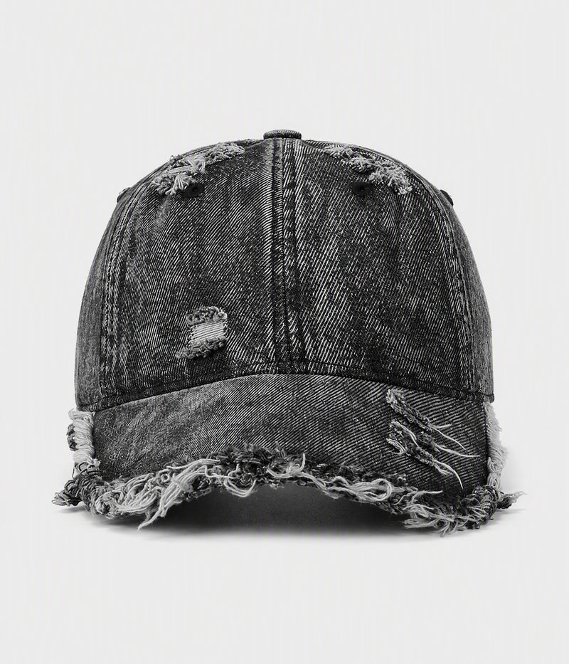 SHREDDED DENIM. acid-wash cotton denim cap in black, front view