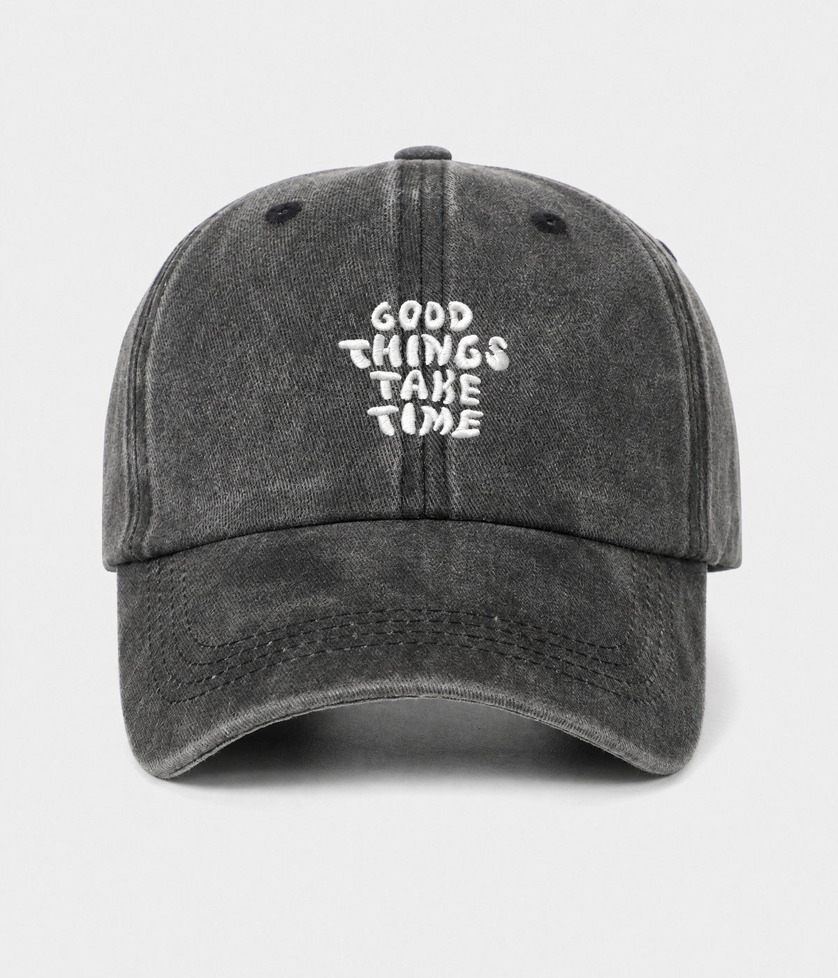 GOOD THINGS TAKE TIME. washed cotton dad cap in black, front view