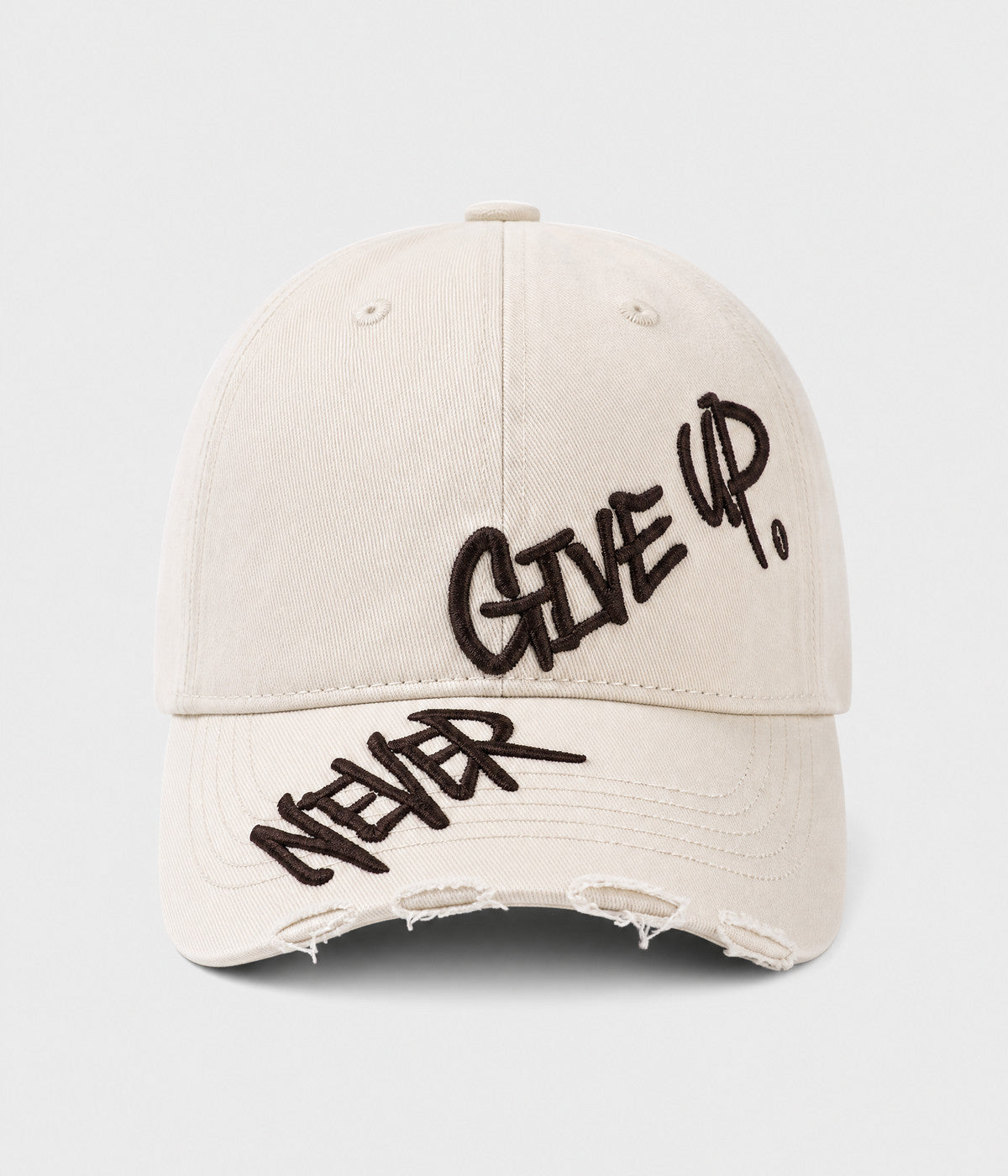 NEVER GIVE UP. washed distressed cotton dad cap in BEIGE, front view