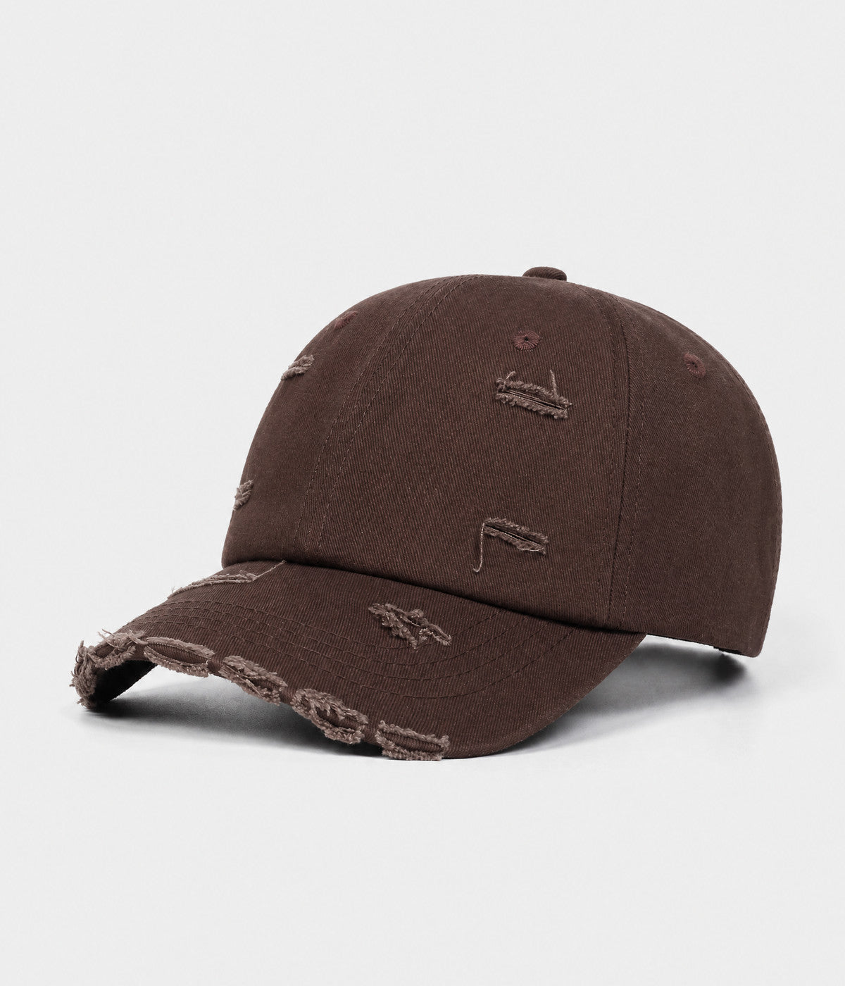 RIPPED COTTON. distressed cotton cap in brown, side view