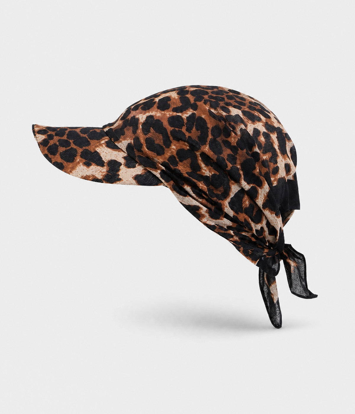PEAKED BANDANA CAP. peaked bandana cap in leopard print, front view