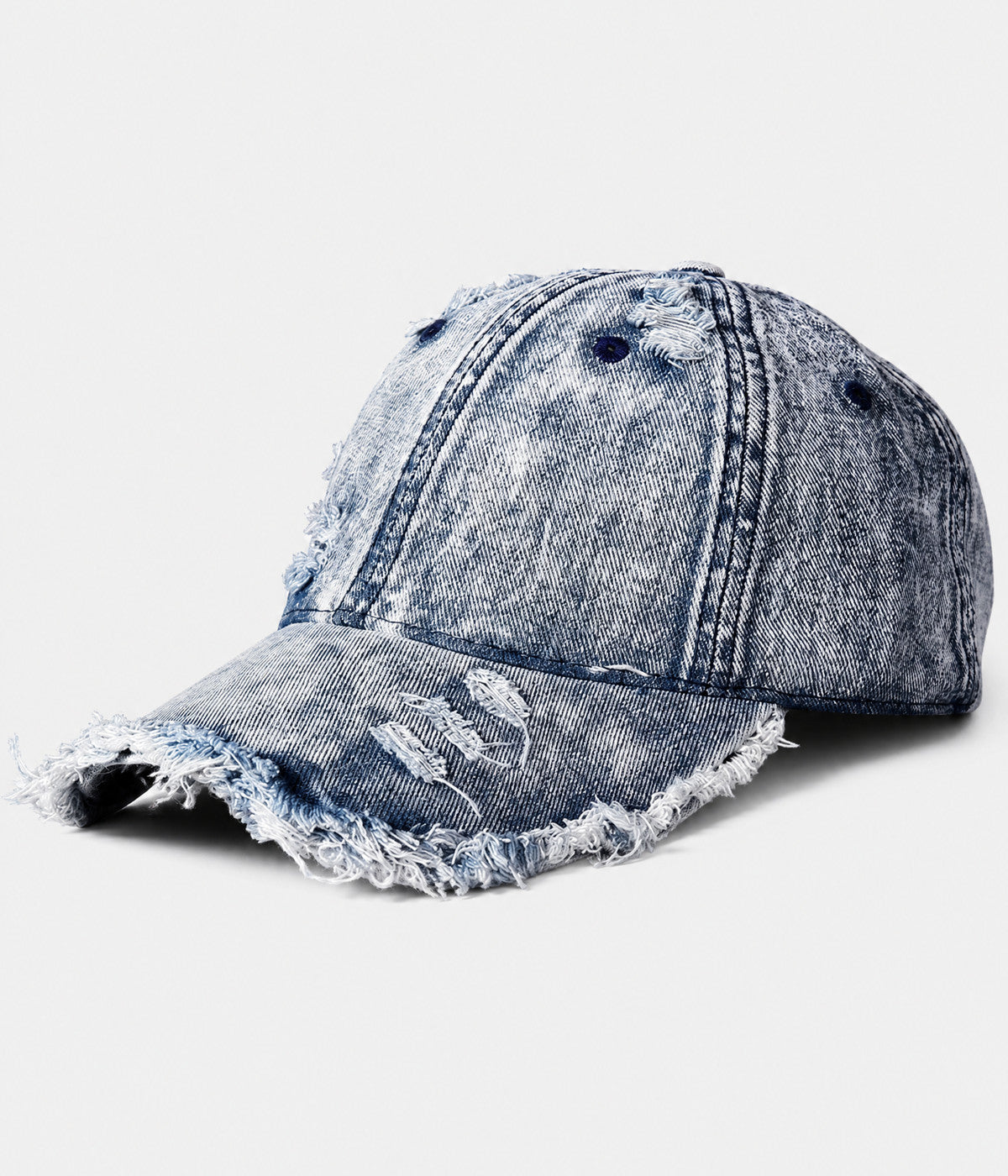 SHREDDED DENIM. acid-wash cotton denim cap in light blue, side view