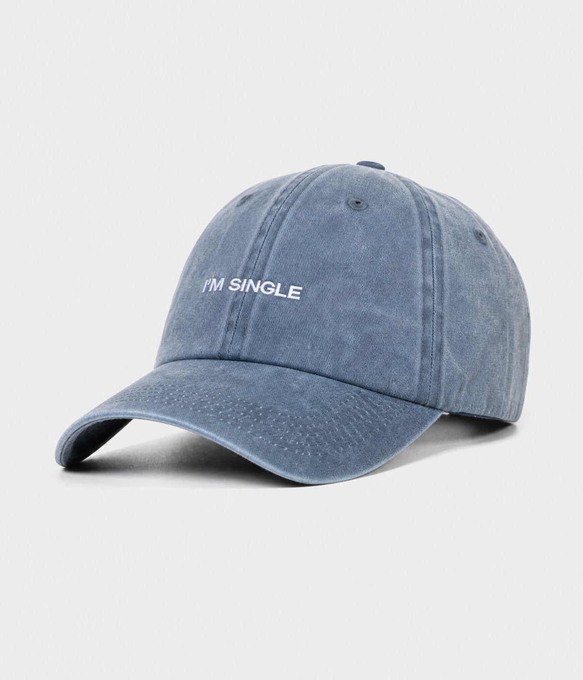 WASHED I'M SINGLE. washed cotton dad cap in NAVY, side view