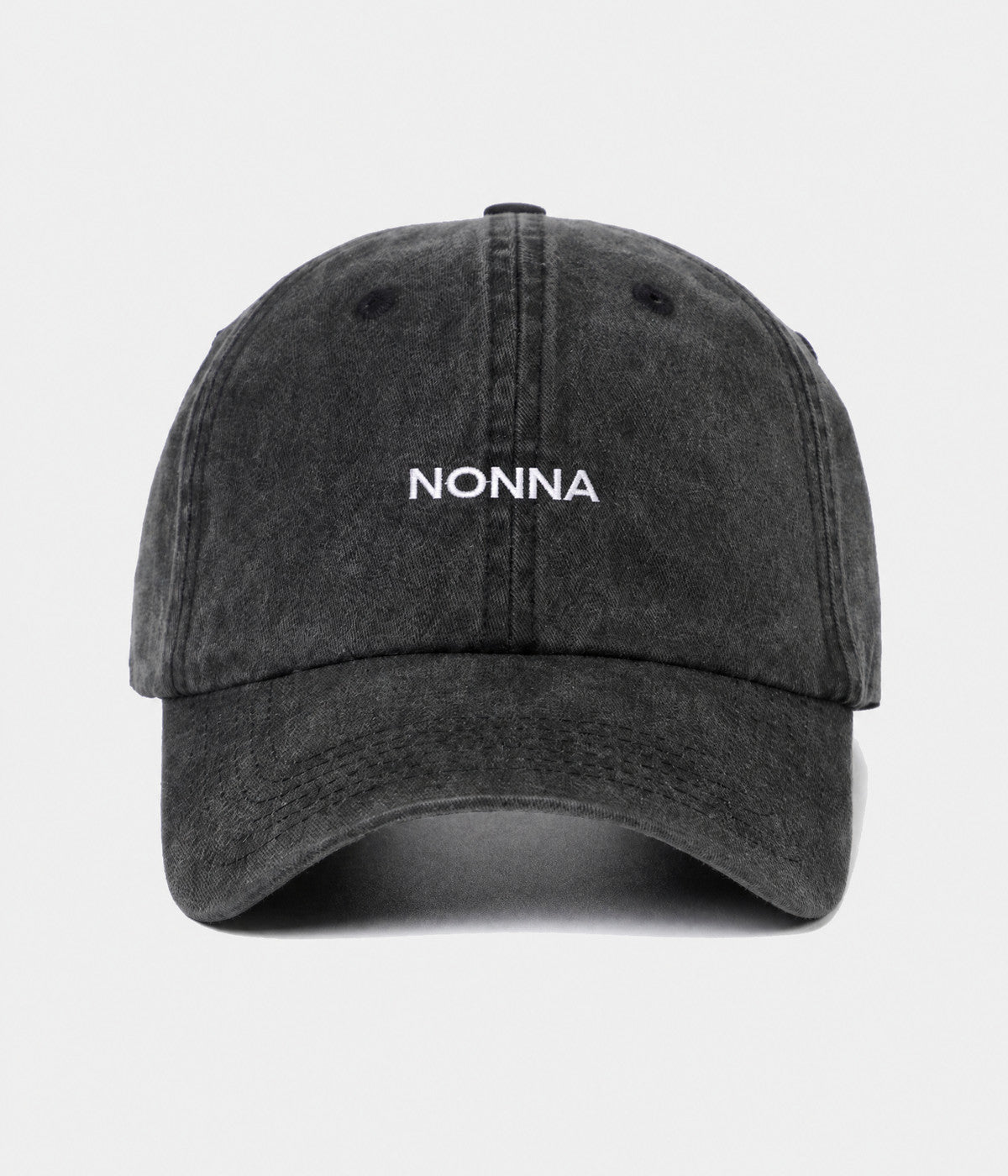 WASHED NONNA. washed cotton dad cap in BLACK, front view