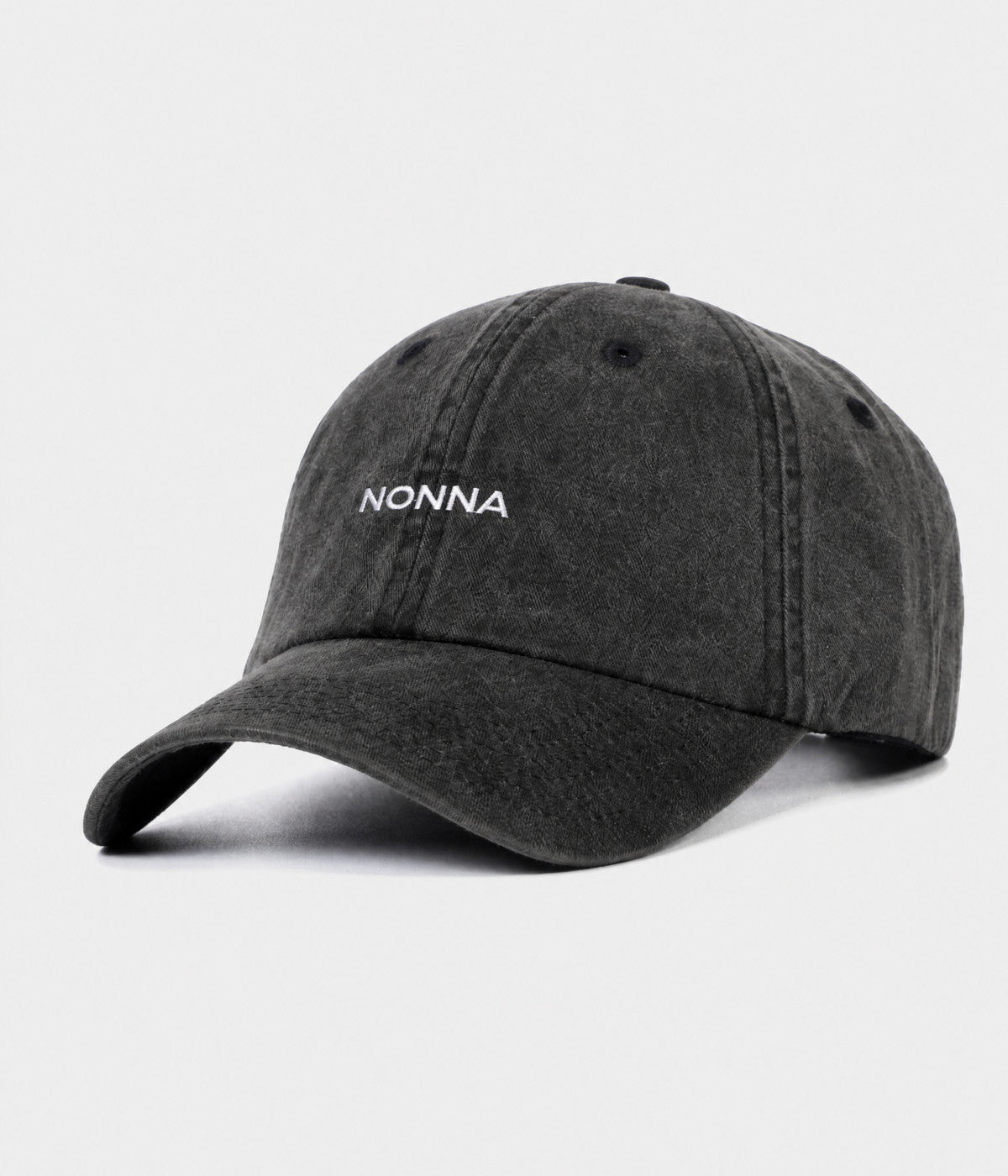 WASHED NONNA. washed cotton dad cap in BLACK, side view