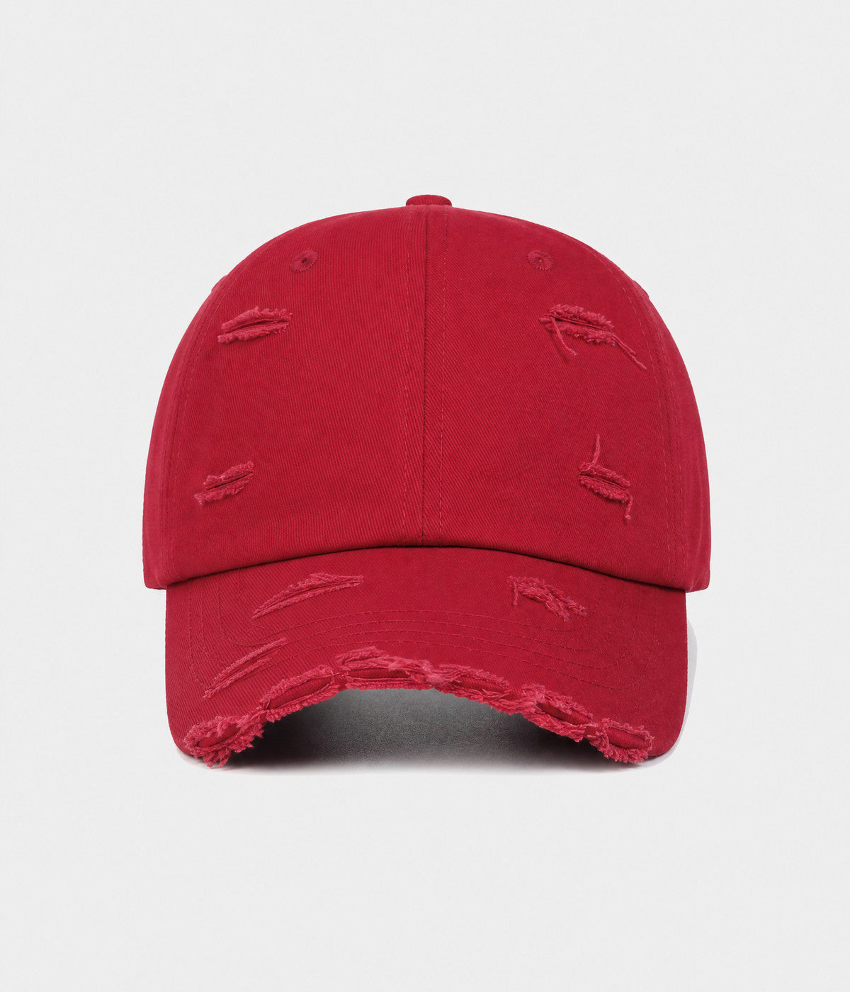 RIPPED COTTON. distressed cotton cap in red, front view