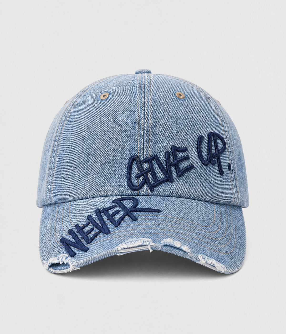 NEVER GIVE UP. washed distressed cotton dad cap in DENIM, front view