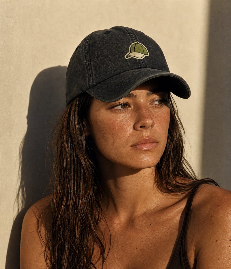 WASHED CAP ON CAP. — OLIVE GREEN worn
