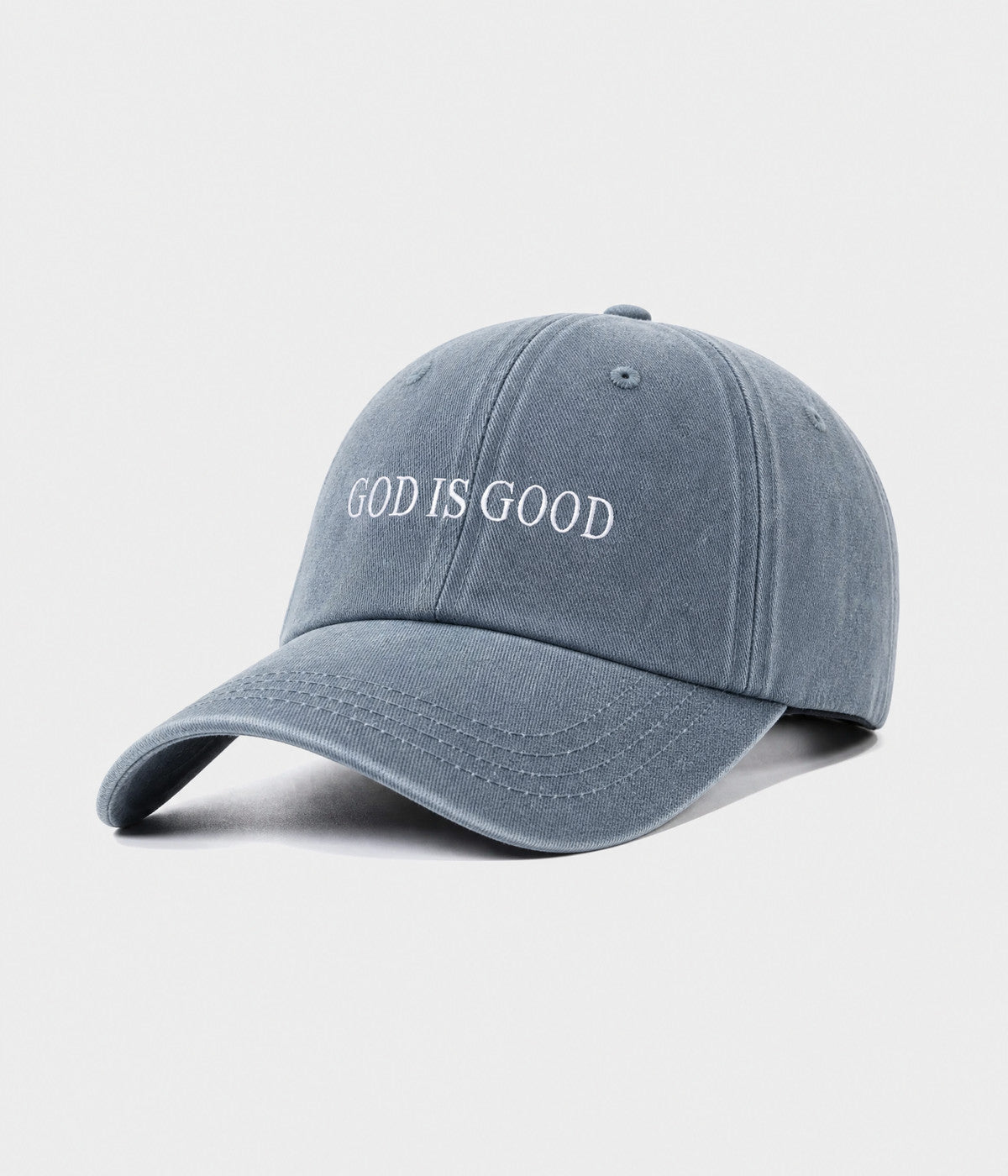 GOD IS GOOD. washed cotton cap in blue, side view