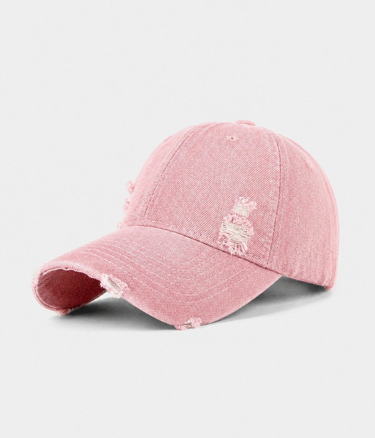 RIPPED DENIM. washed cotton denim cap in pink, side view
