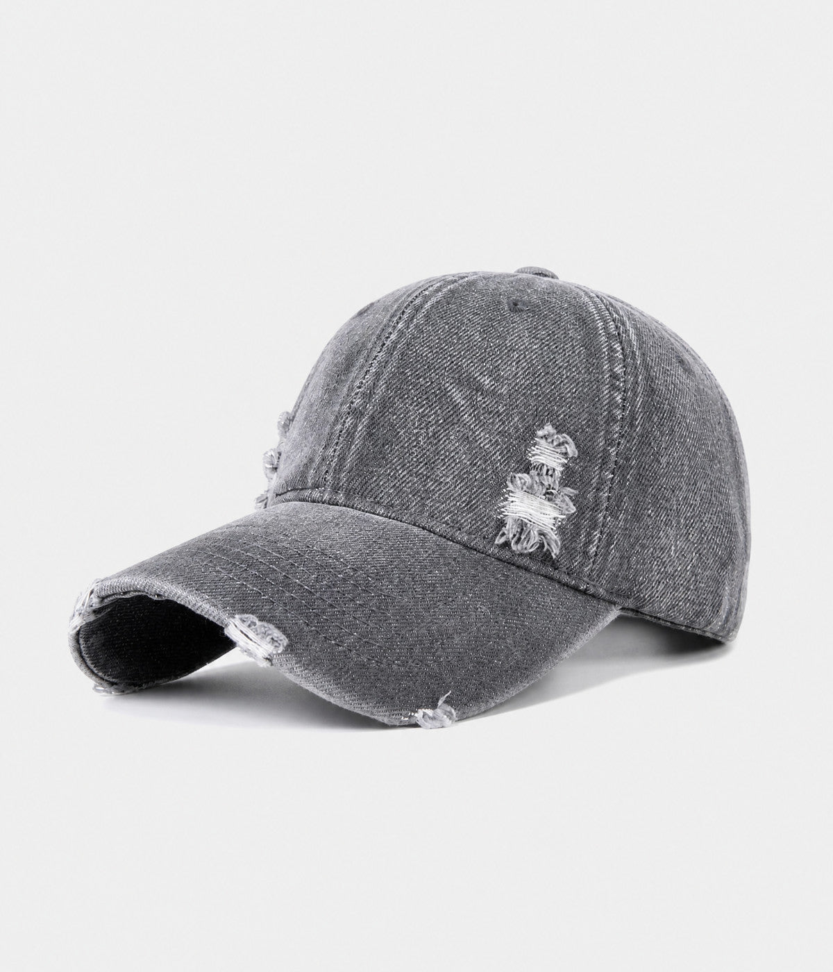 RIPPED DENIM. washed cotton denim cap in dark gray, side view
