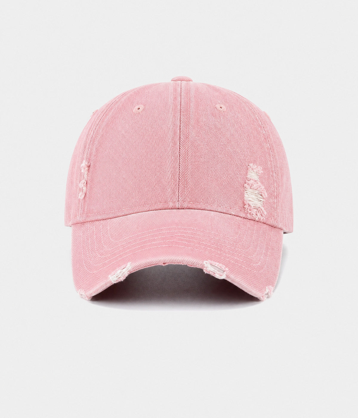 RIPPED DENIM. washed cotton denim cap in pink, front view