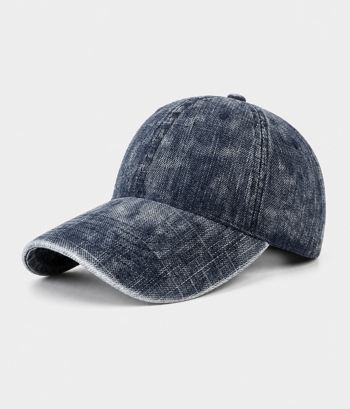 DENIM FADE. washed cotton cap in navy, side view
