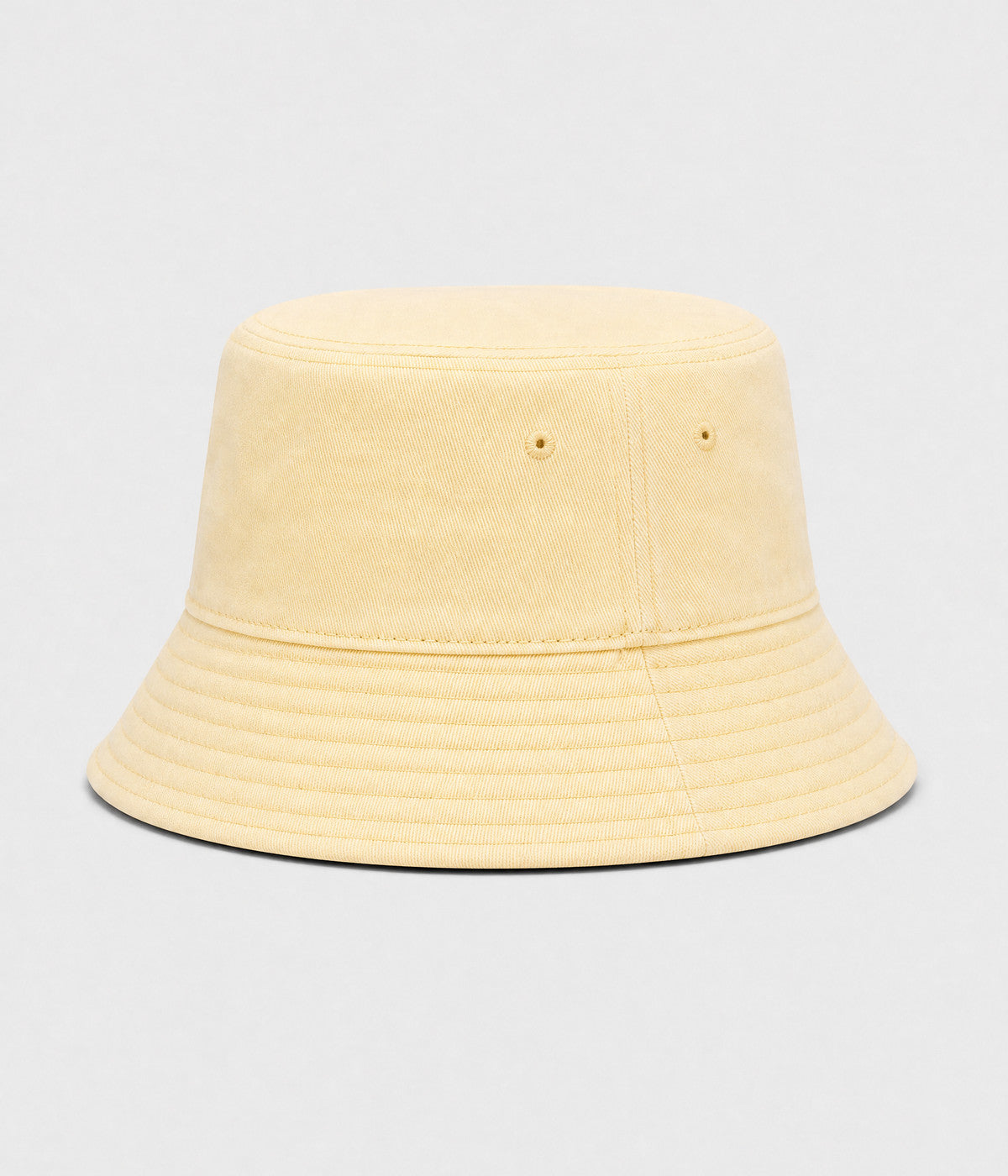 WASHED COTTON BUCKET. washed cotton bucket hat in yellow, front view