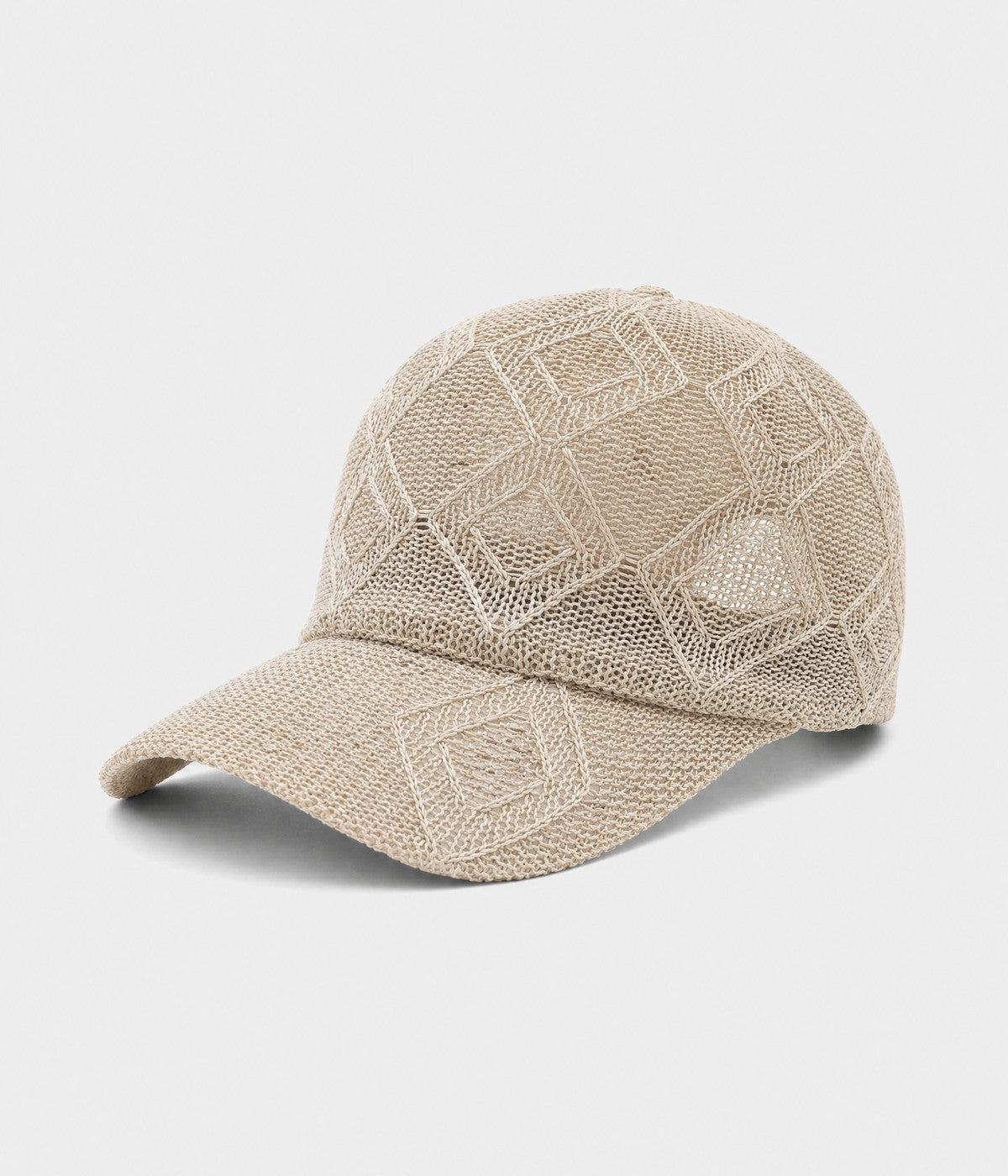OPEN KNIT. open-knit lattice cap in beige, side view