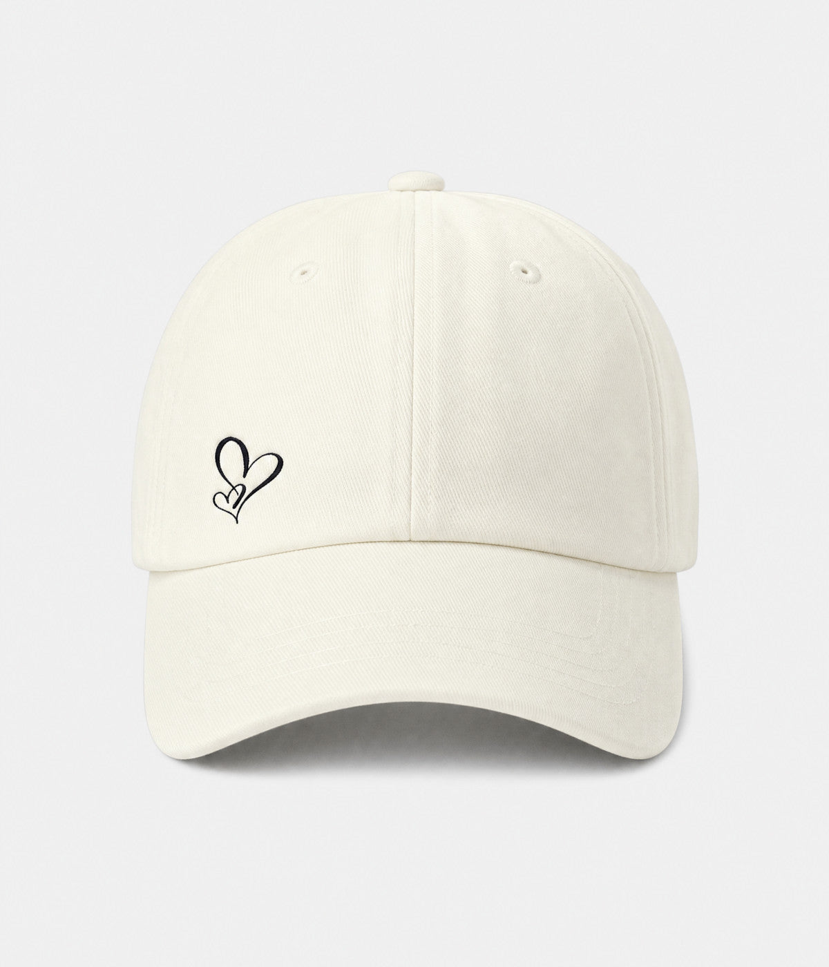 TWO HEARTS. cotton dad cap in cream, front view