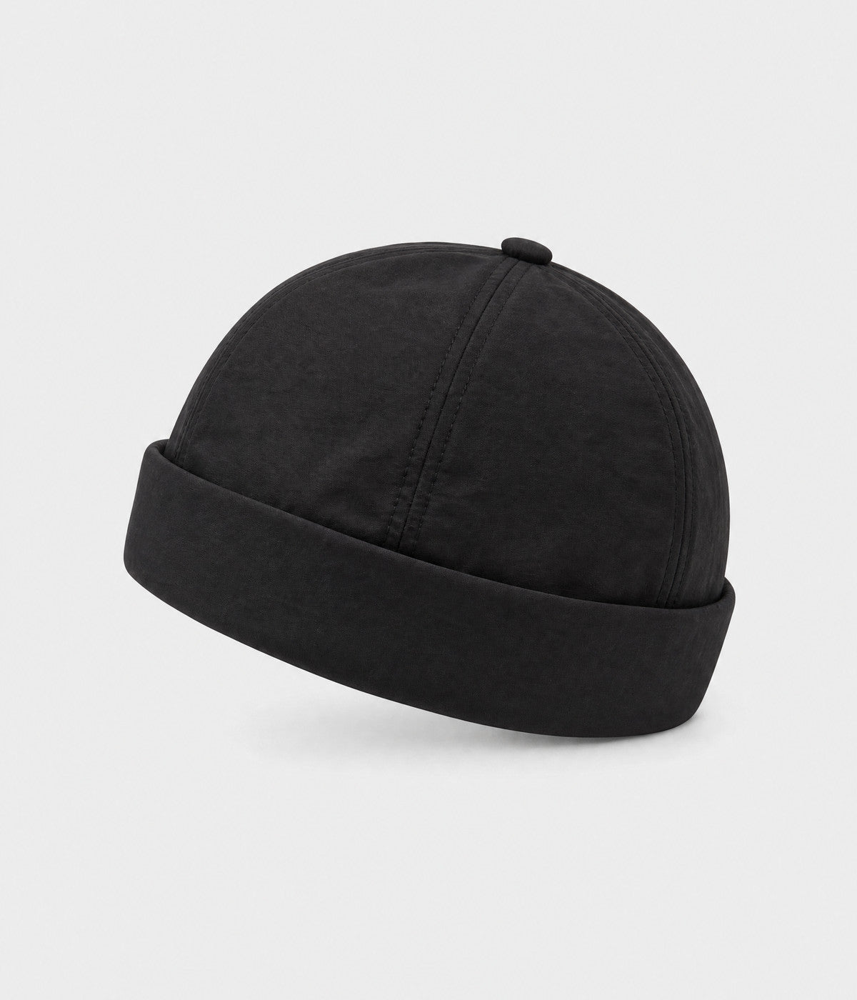 QUICK DRY DOCKER. quick-dry brimless docker cap in black, front view