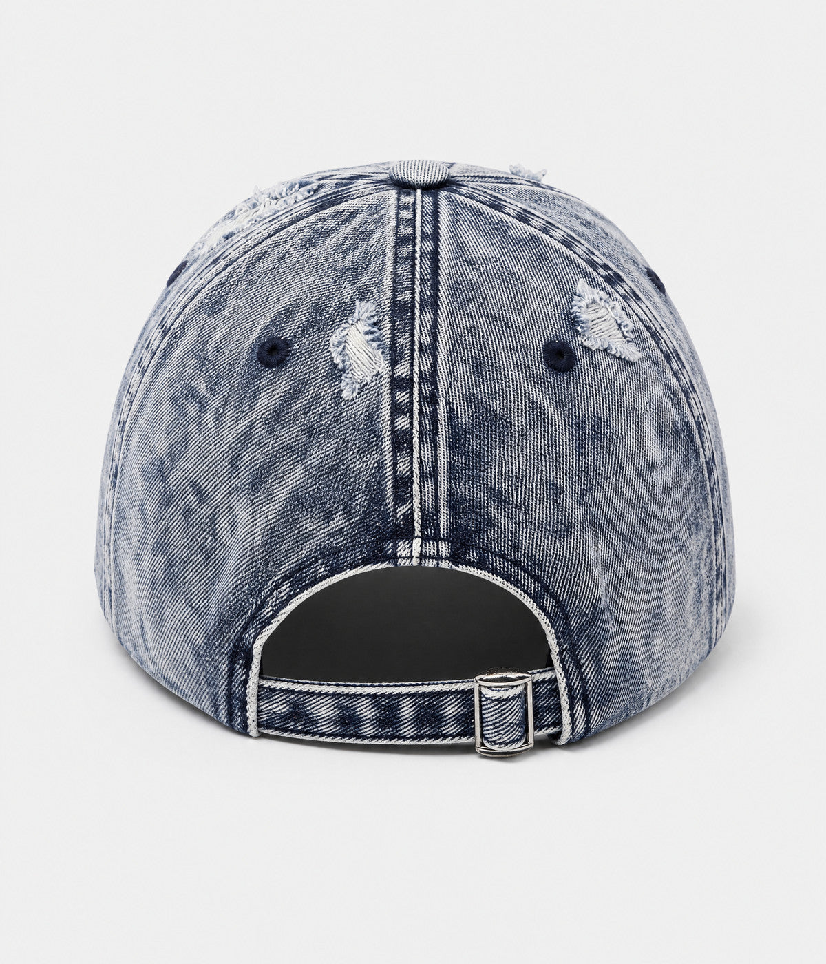 SHREDDED DENIM. acid-wash cotton denim cap in blue, back view