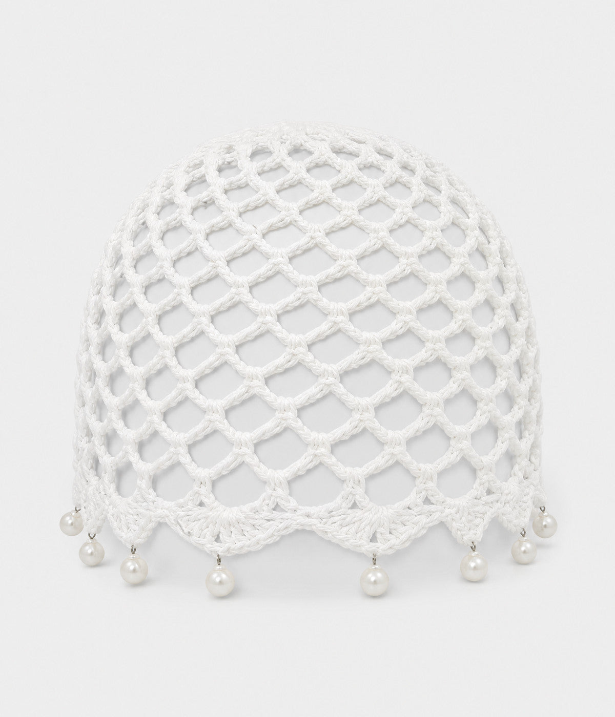 PEARL CROCHET CAP. open-mesh crochet cloche with pearl trim in white, front view