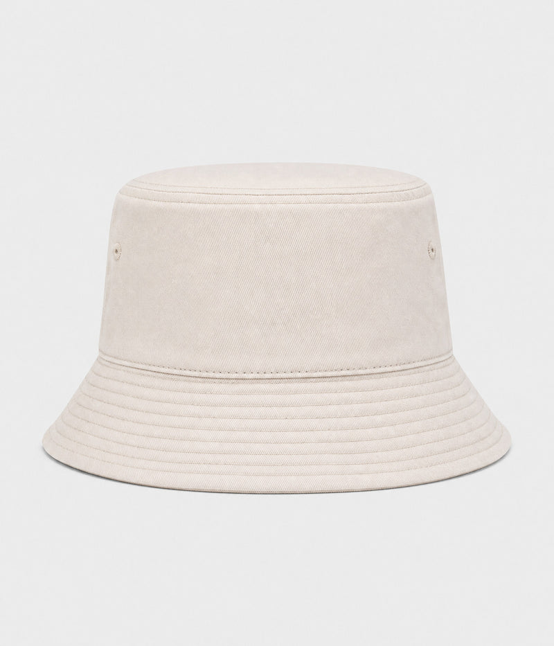 WASHED COTTON BUCKET. washed cotton bucket hat in beige, front view