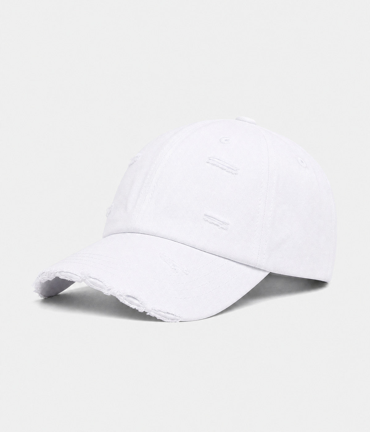 RIPPED COTTON. distressed cotton cap in white, side view
