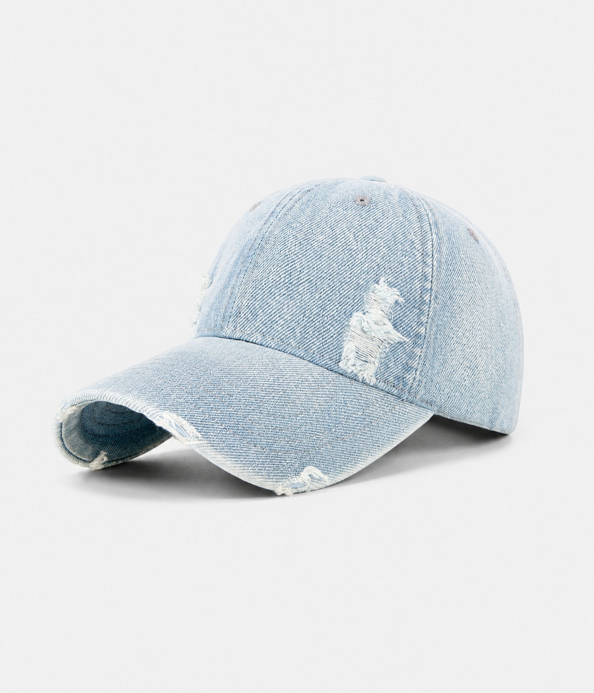 RIPPED DENIM. washed cotton denim cap in light blue, side view