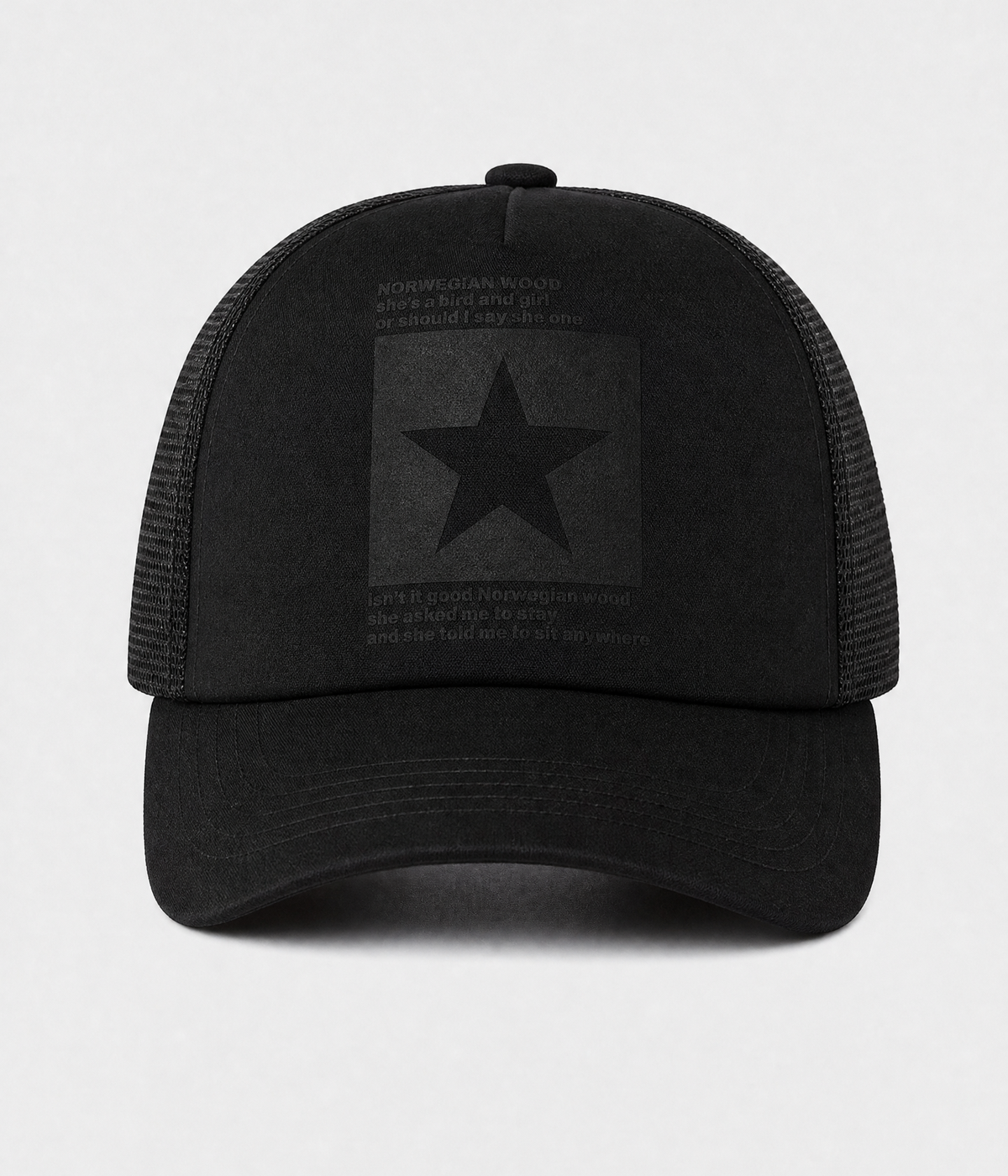 STAR TRUCKER. cotton-polyester trucker cap in all black, front view