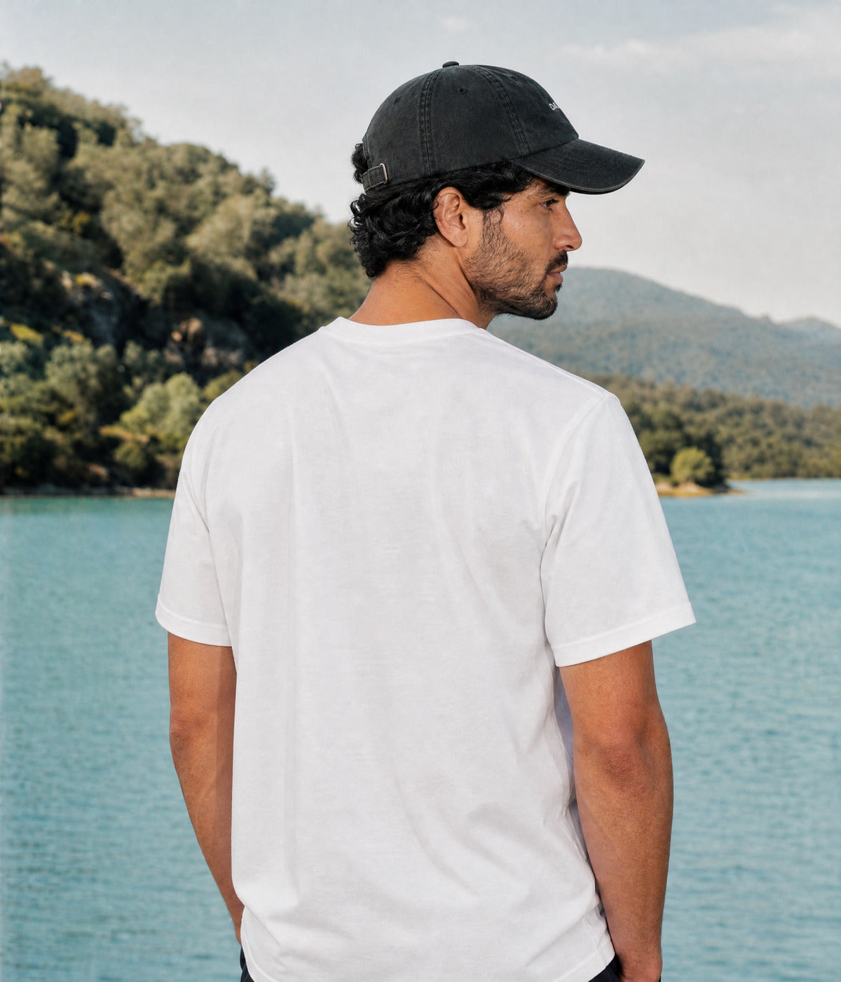 DRAWN HEART TEE. WHITE worn by a man, back view