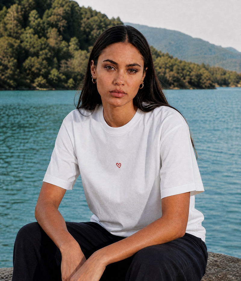 DRAWN HEART TEE. WHITE worn by a woman