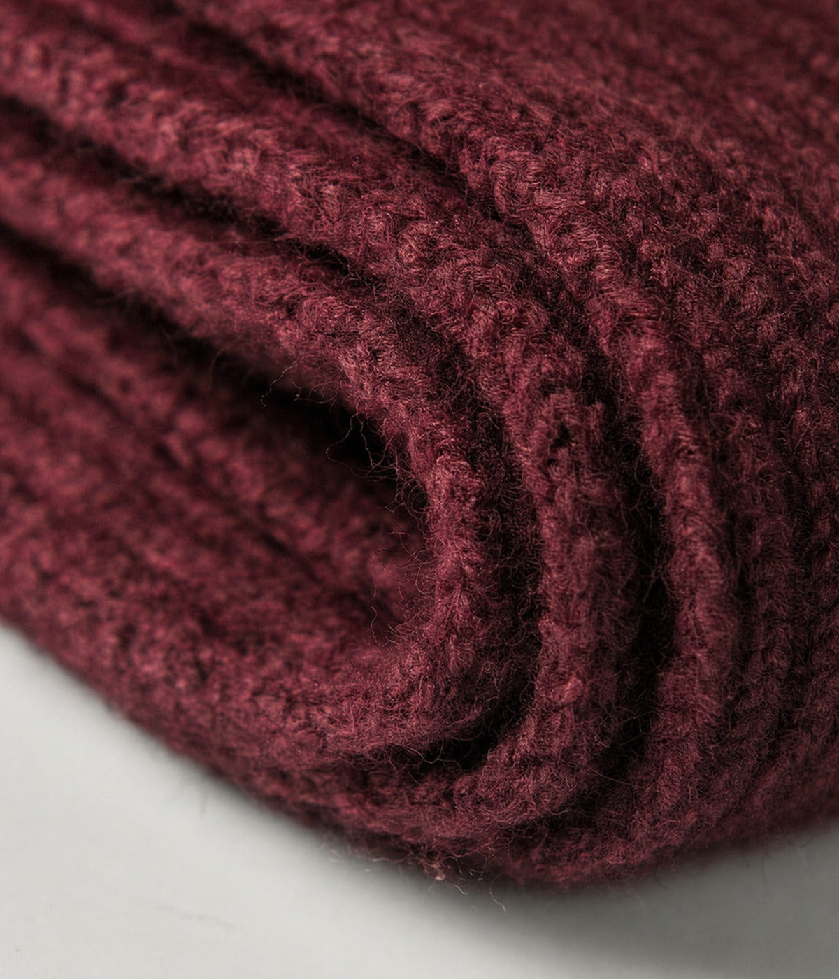 CLASSIC SCARF. knit scarf in DARK RED, soft knit texture close-up