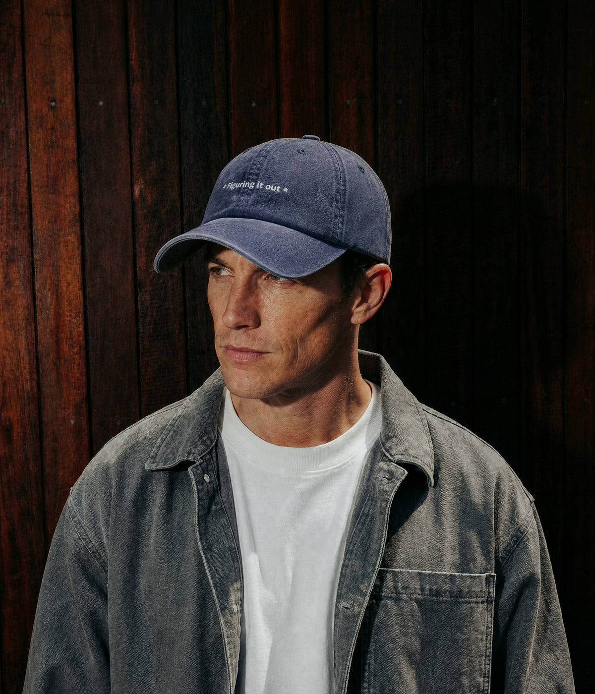 FIGURING IT OUT. NAVY worn by a man