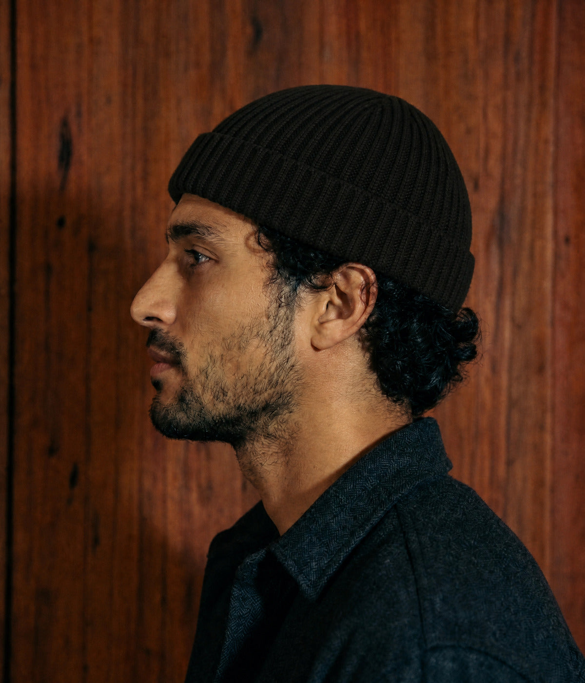 FISHERMAN BEANIE. — BLACK worn