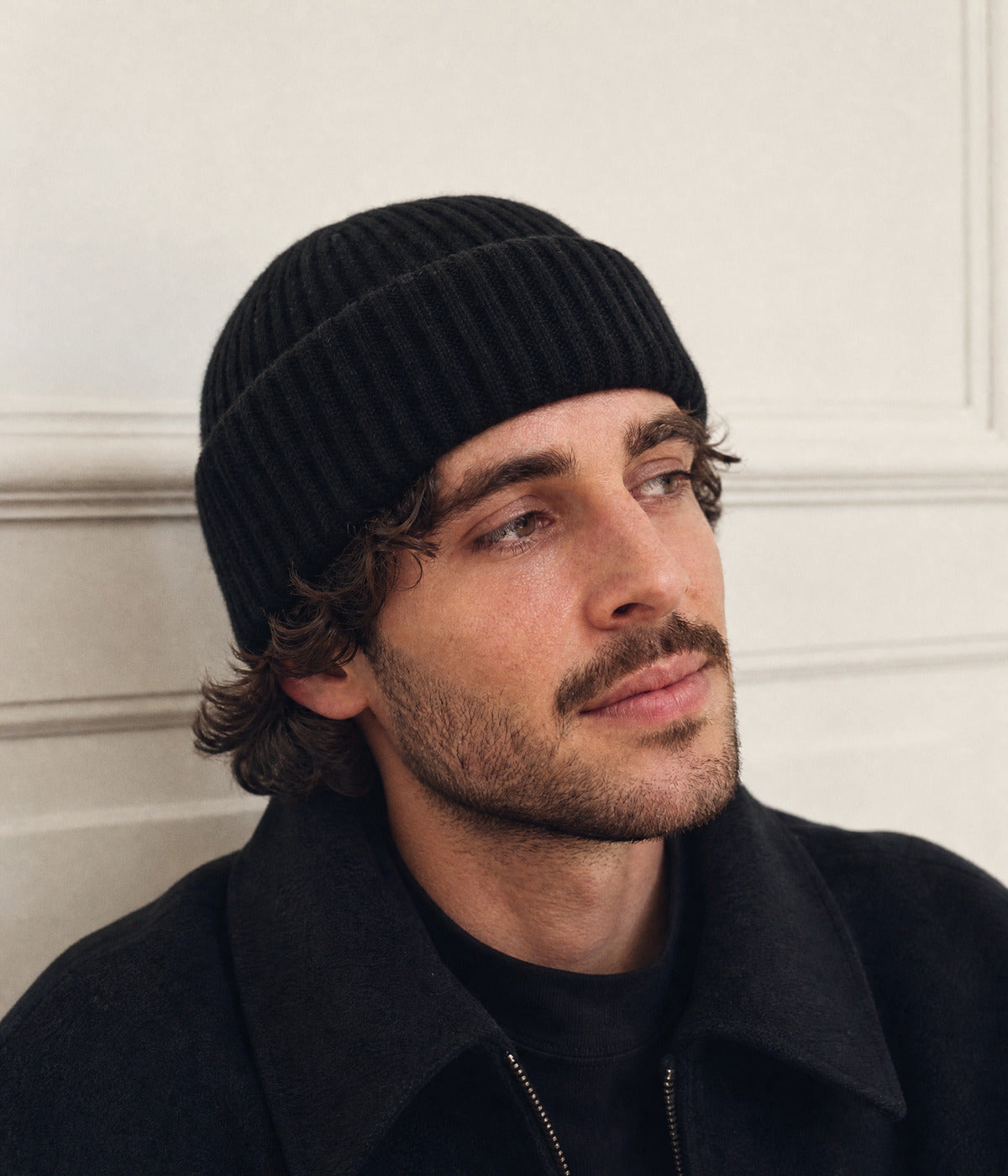 FISHERMAN BEANIE - 100% MERINO. — BLACK worn