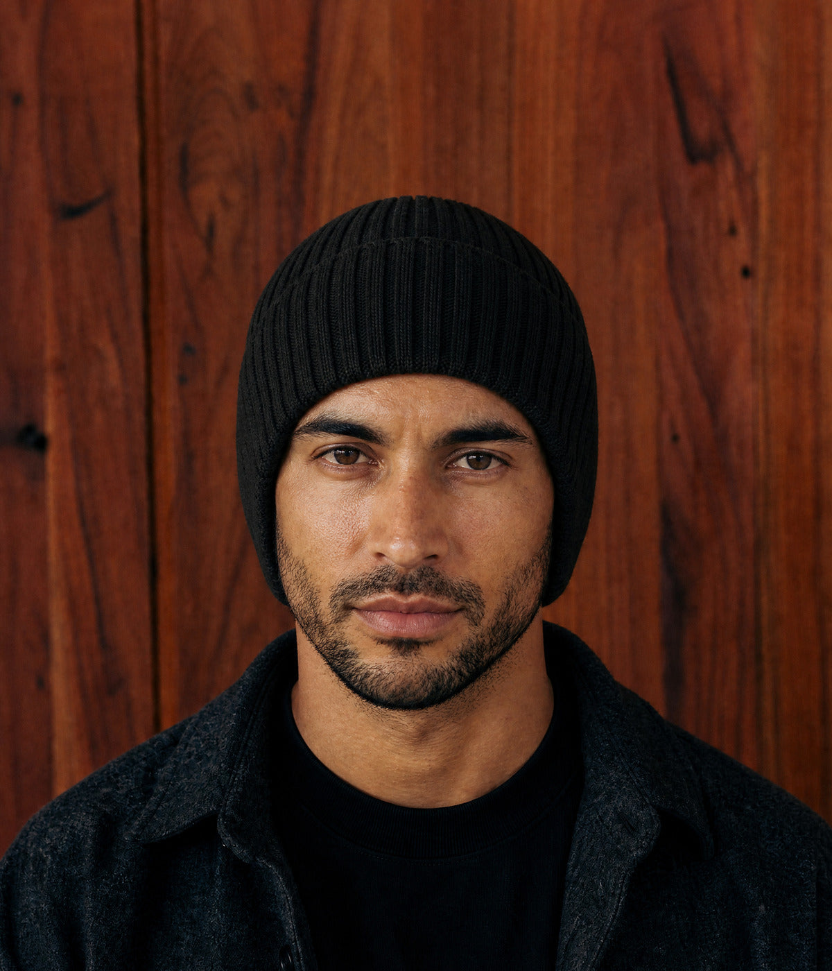 KNIT EARMUFF BEANIE. — BLACK worn