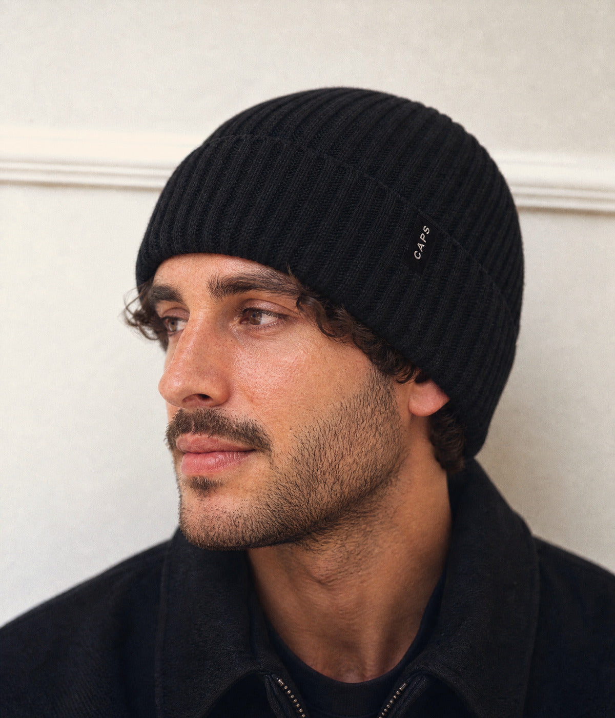 LOGO MID FIT BEANIE. — BLACK worn