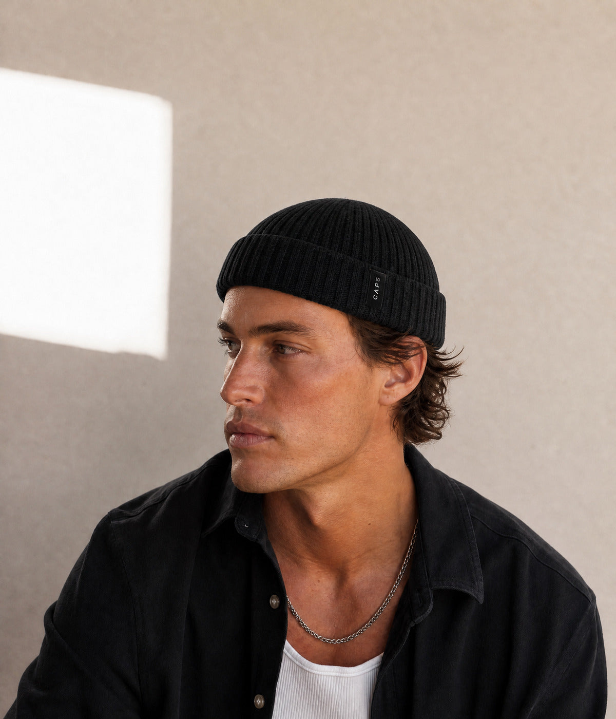 LOGO WOOL FISHERMAN BEANIE. — BLACK worn
