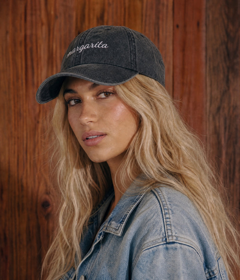 MARGARITA - CURSIVE. BLACK worn by a woman