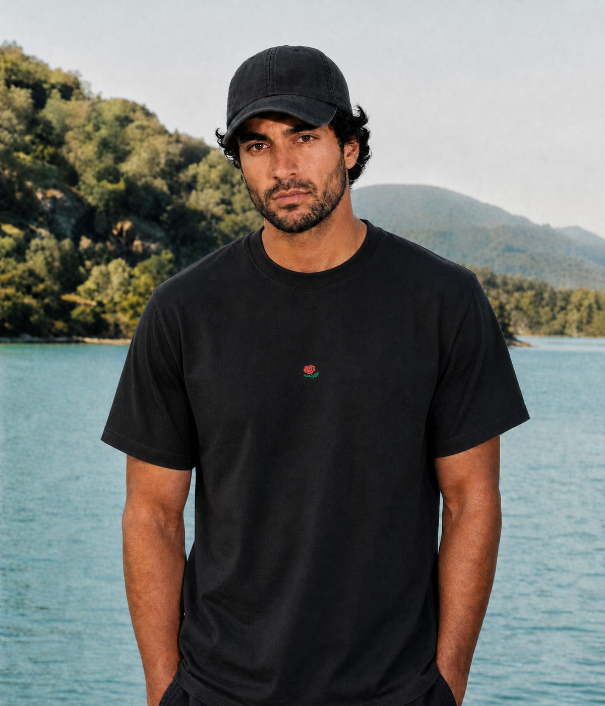 ROSE TEE. BLACK worn by a man