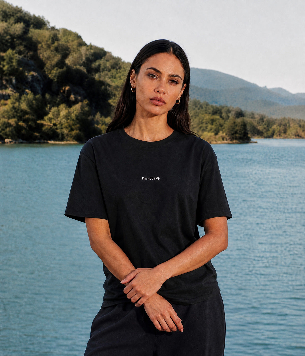 NOT A DJ TEE. BLACK worn by a woman