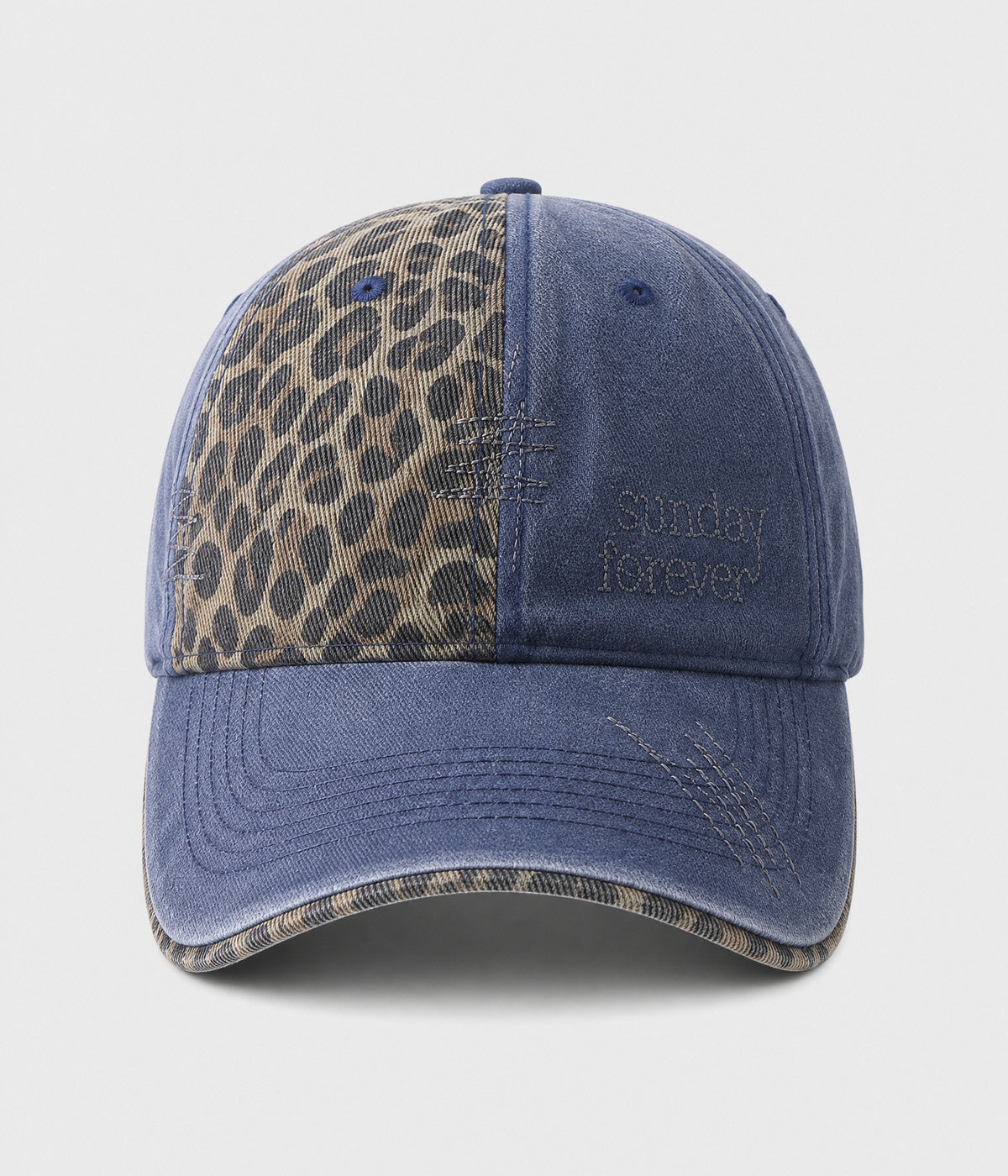 SUNDAY FOREVER. washed half-leopard dad cap in NAVY, front view